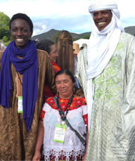 Carmen Garcia Maldonado at IFAM in 2015, posing with 2 artisans from Niger.