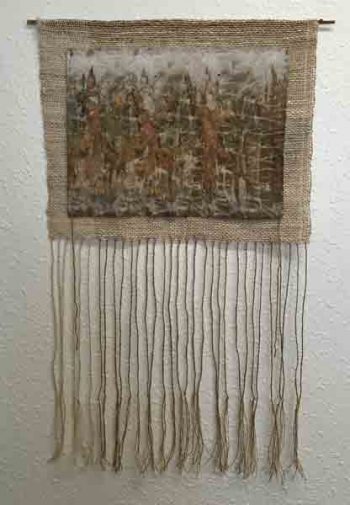 Judy Newland sustainable eco-dyeing, 2013 Wild silk Arizona black walnut, eucalyptus leaves and desert fern tree pods Woven with linen and aloo (nettle) sustainably gathered by women in Nepal and handspun 14” X 12” woven; 14” twisted fringe