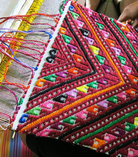Weavers in Chinantla, Mexico use gorgeous vivid colors. Photo credit Tia Stephanie Tours